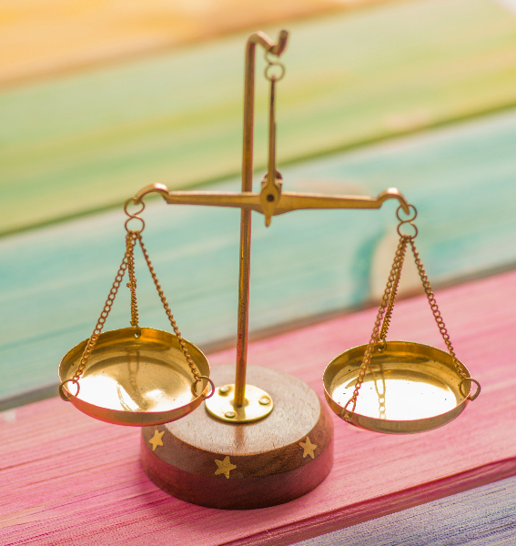 Picture of scales against a colorful background