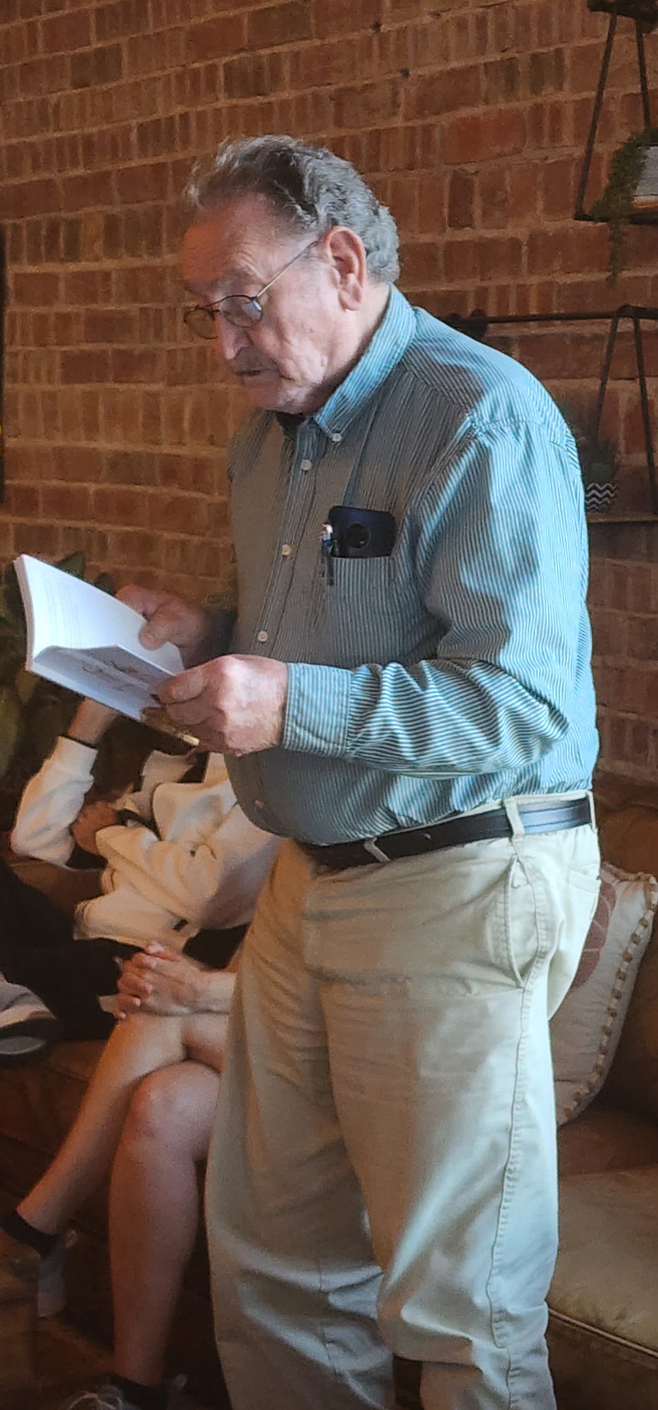 Picture of J.V. Lewis reading a selection of his work