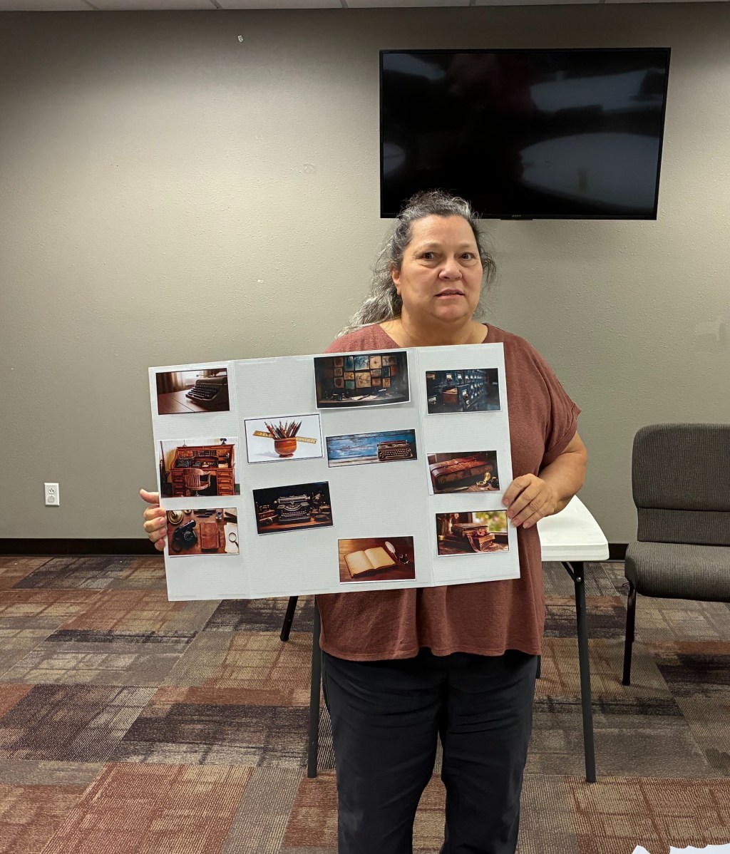 Picture of woman holding a board with photographs